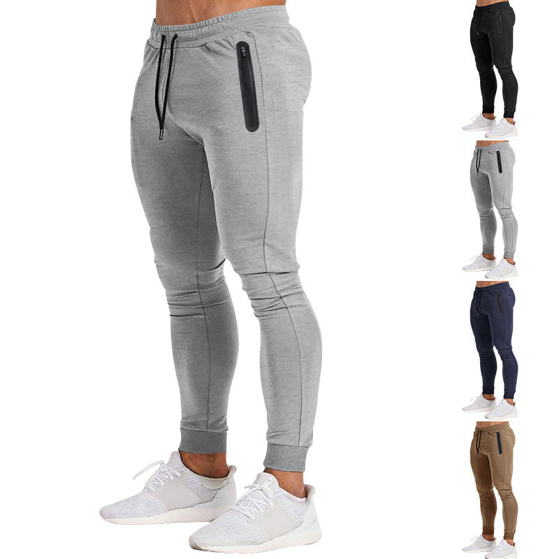Herren schmal geschnittene Jogginghose mit Reißverschlusstaschen und Kordelzug Echoarchiv