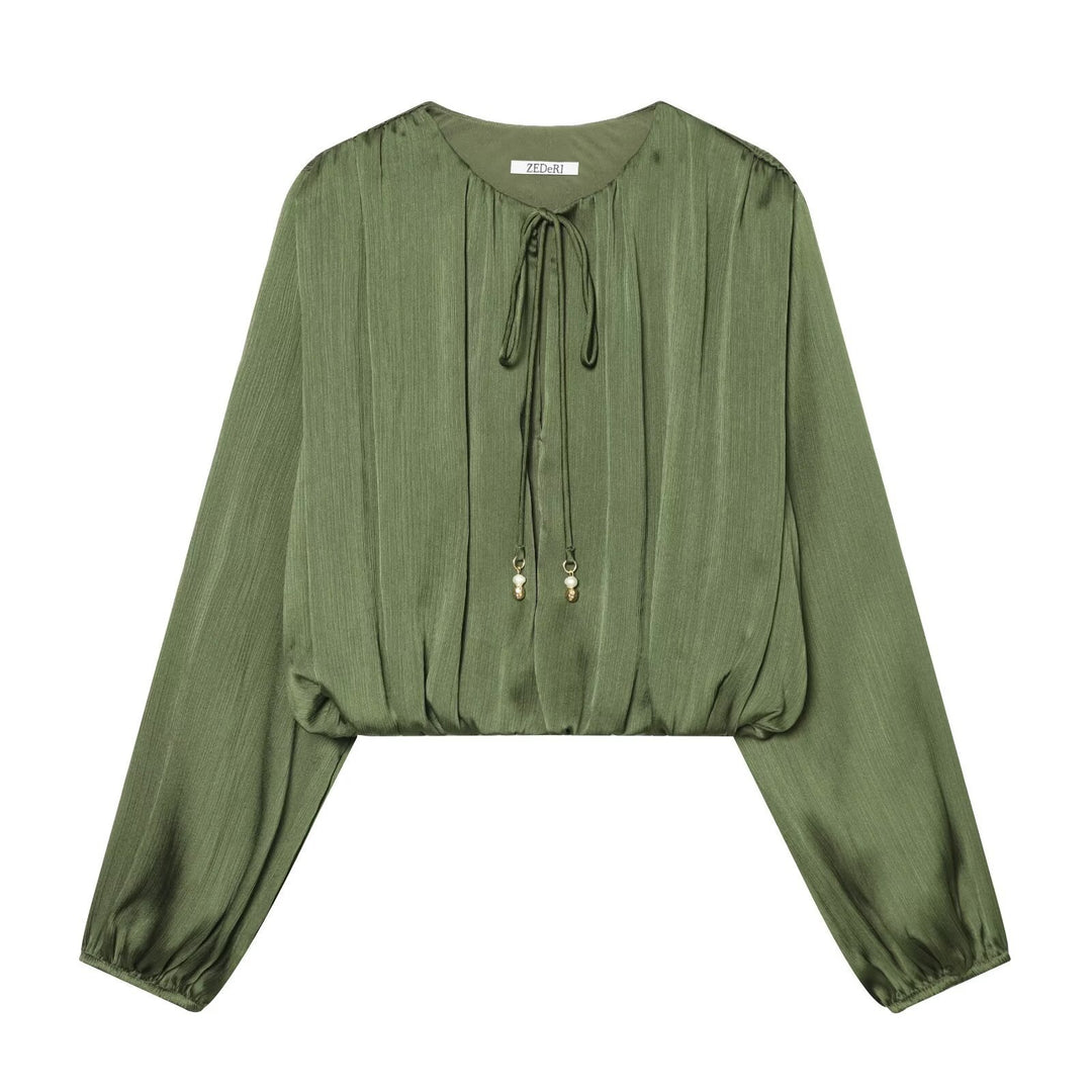 Damen Cropped Plissee-Bluse mit Kordelverschluss und Ballonärmeln Echo Archiv