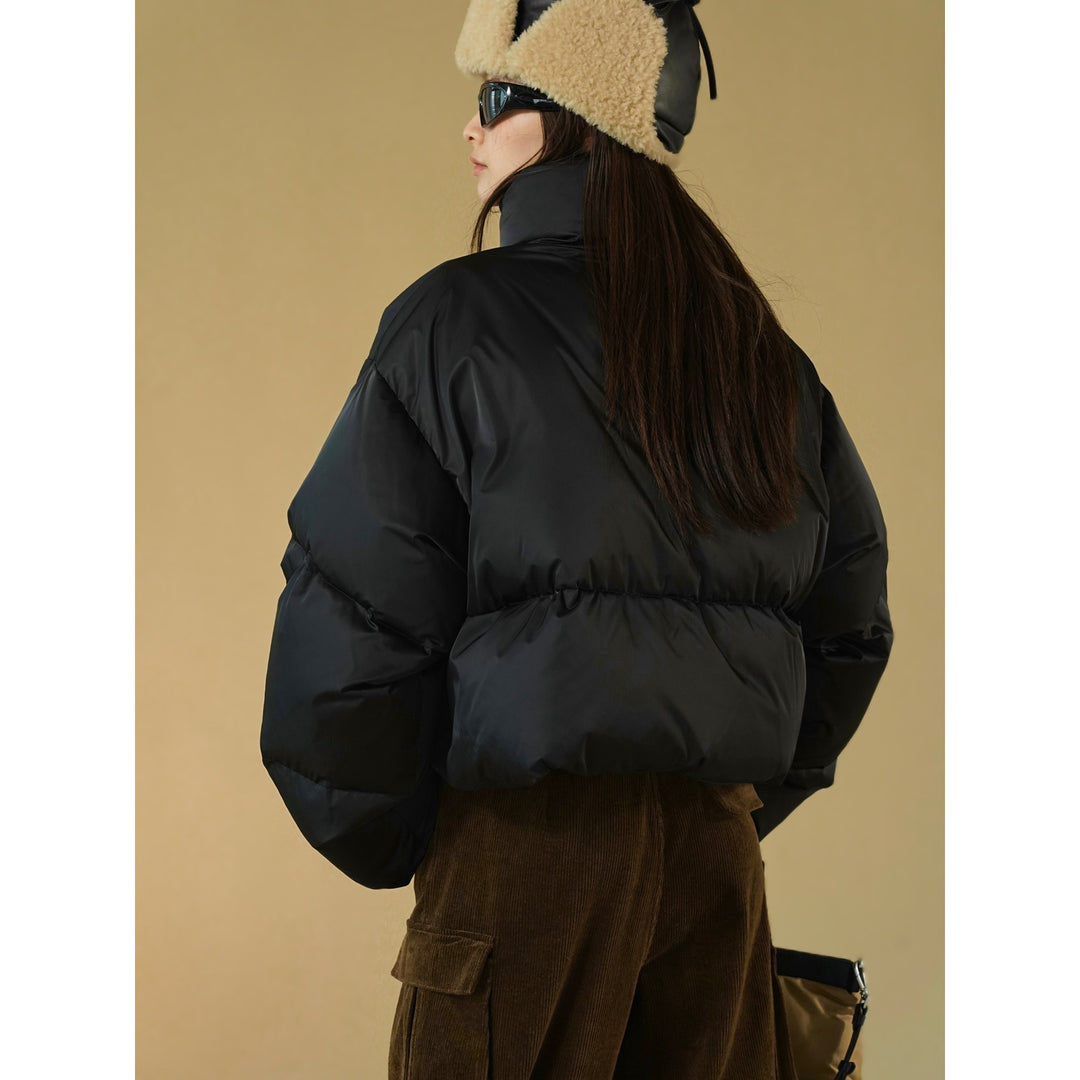 Damen Kurz geschnittene gesteppte Pufferjacke mit hohem Stehkragen und wärmeisolierender Füllung Echoarchiv