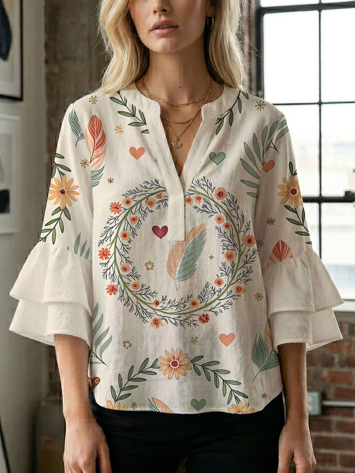 Damen Bluse mit voluminösen Flügelärmel und intensivem Blattmuster Echo Archiv
