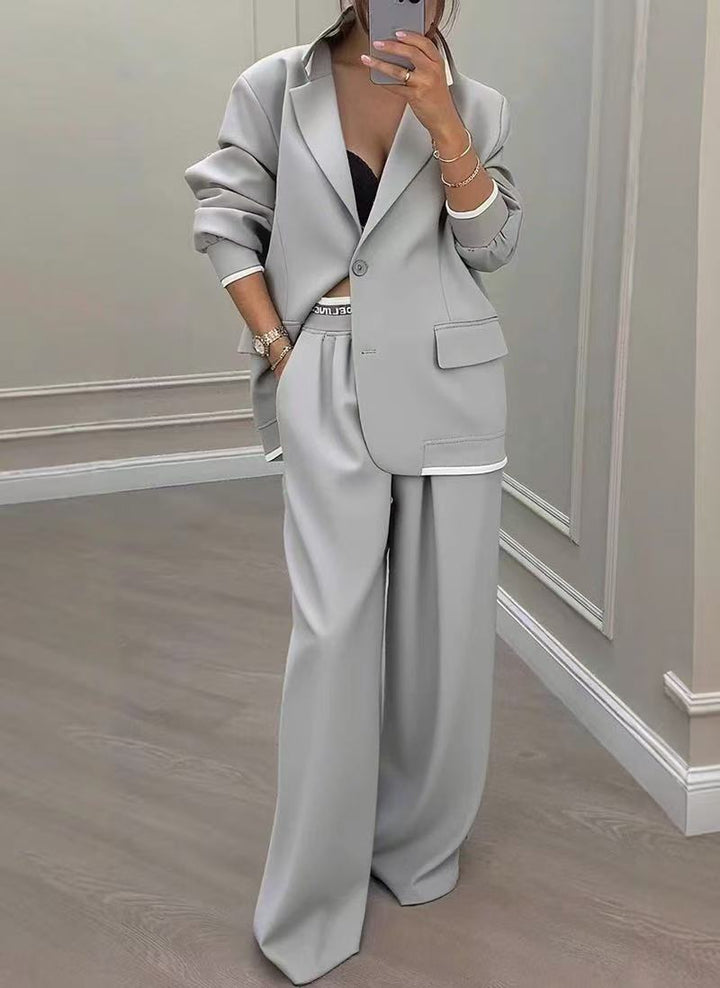 Damen Oversize-Tailoring-Set mit Kontrastpaspel, Single-Button-Blazer und hochgeschnittener Weitbeinhose – Valéne