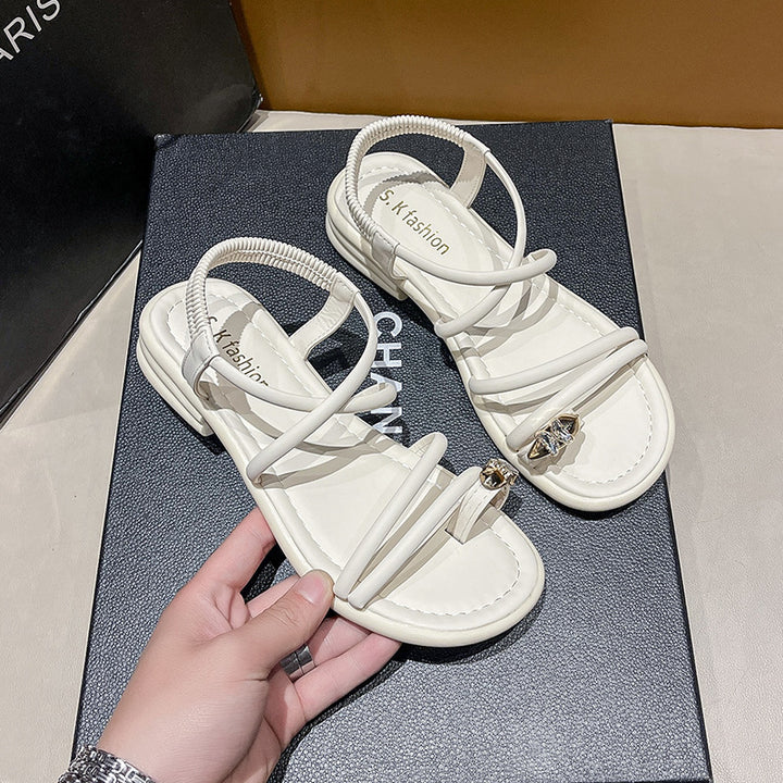 Damen Flache Riemchensandalen mit Zehensteg, elastischem Fersenriemen und Schmuckapplikation – Sorelia