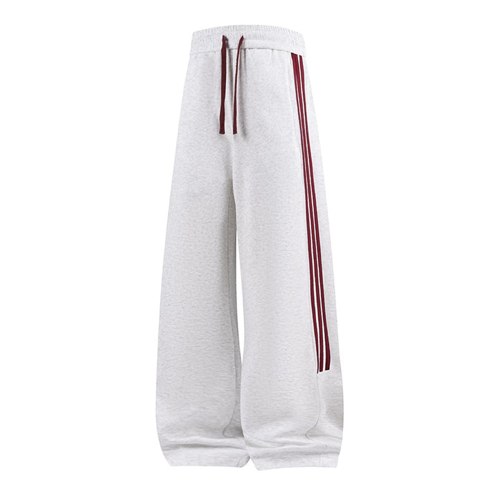 Damen Weite High-Waist Jogginghose mit markanten Seitenstreifen & Kordelzug Echoarchiv