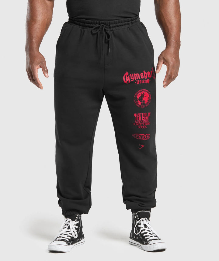 Herren nan konisch geschnittene Baumwollfleece-Sweathose mit elastischem Kordelbund gerippten Beinabschlüssen und großflächigem Logodruck Echo Archiv