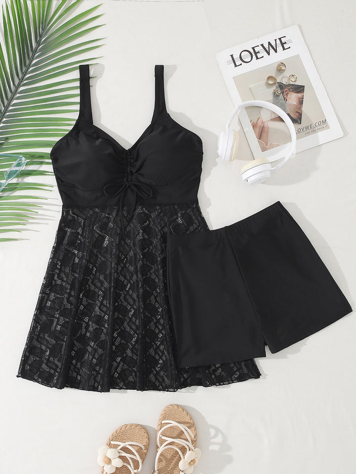 Damen Strandkleid mit raffiniertem Schnitt und floralen Details Echo Archiv