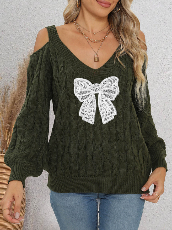 Damen modischer Pullover mit verspielt eingestricktem Schleifenmotiv Echo Archiv