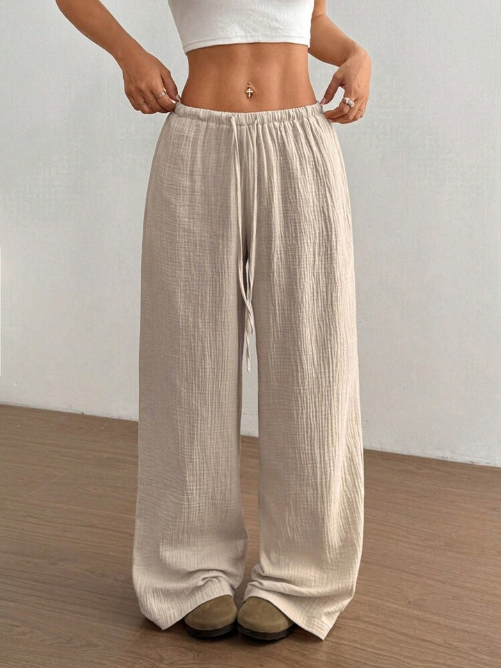 Damen weite Leinenoptik-Loungehose mit hohem Gummibund, Kordelzug & Crinkle-Struktur – Avérine