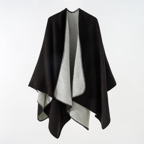 Damen Reversibler Strickponcho mit Zierkettnaht und Oversize-Fall Echo Archiv