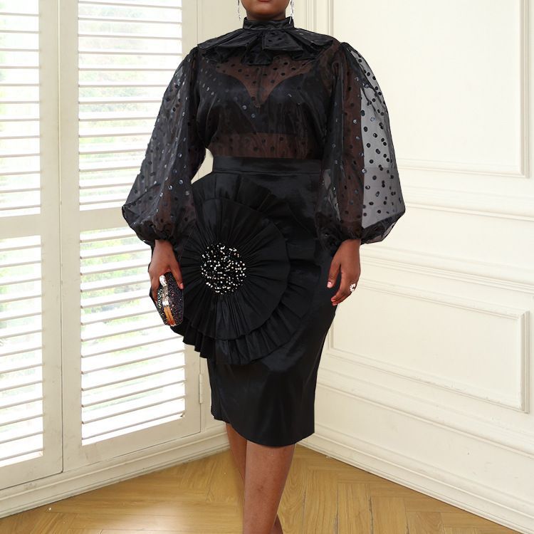 Damen Elegantes Kleid mit transparenten Puffärmeln und Rüschenakzent Echo Archiv
