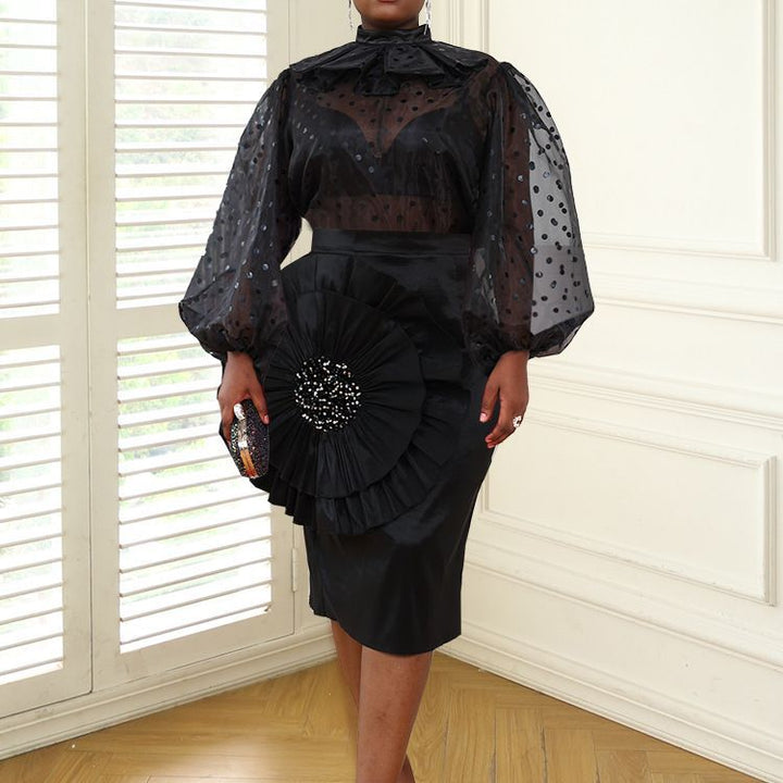 Damen Elegantes Kleid mit transparenten Puffärmeln und Rüschenakzent Echo Archiv