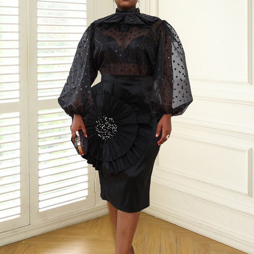Damen Elegantes Kleid mit transparenten Puffärmeln und Rüschenakzent Echo Archiv