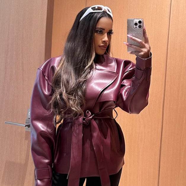 Damen Taillierter Lederimitat-Blouson mit Bindegürtel und voluminöser Schulterpartie Echoarchiv
