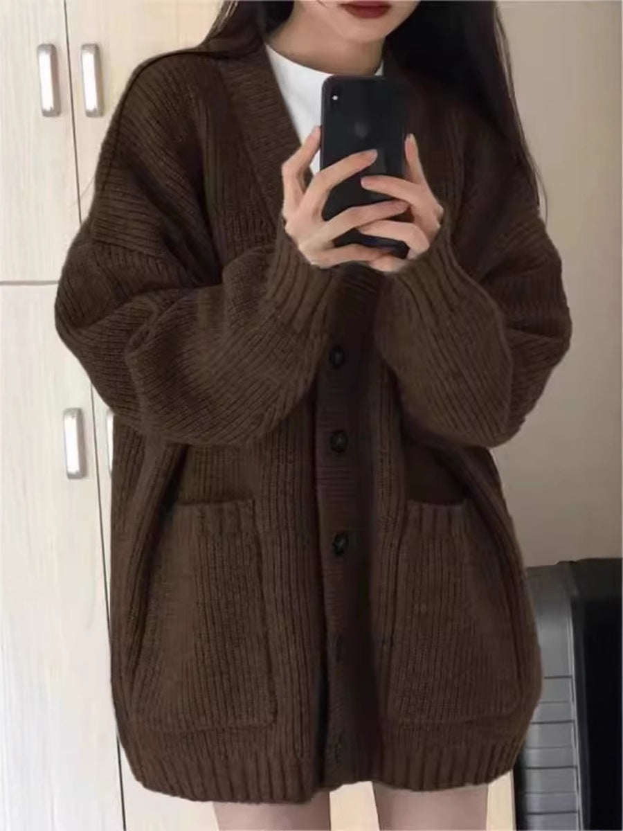 Damen Oversize Strickcardigan mit aufgesetzten Taschen und durchgehender Knopfleiste Echoarchiv
