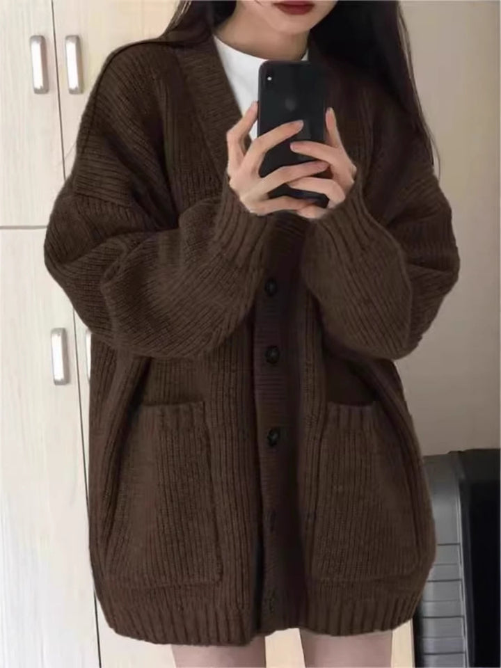 Damen Oversize Strickcardigan mit aufgesetzten Taschen und durchgehender Knopfleiste Echoarchiv