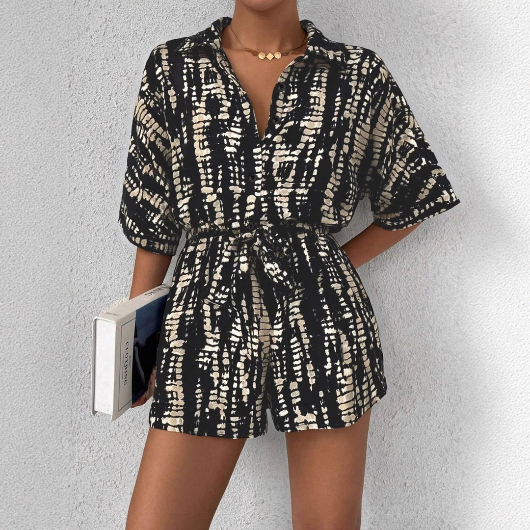 Damen Kurzärmliger Jumpsuit mit floralem Print und Taillengürtel Echo Archiv