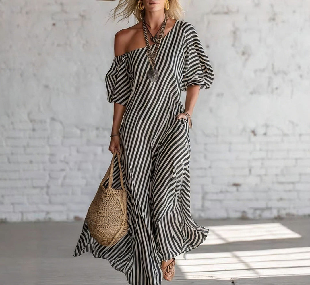 Damen Maxikleid mit asymmetrischem Schnitt und auffälligen Streifen Echo Archiv