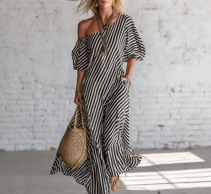 Damen Maxikleid mit asymmetrischem Schnitt und auffälligen Streifen Echo Archiv
