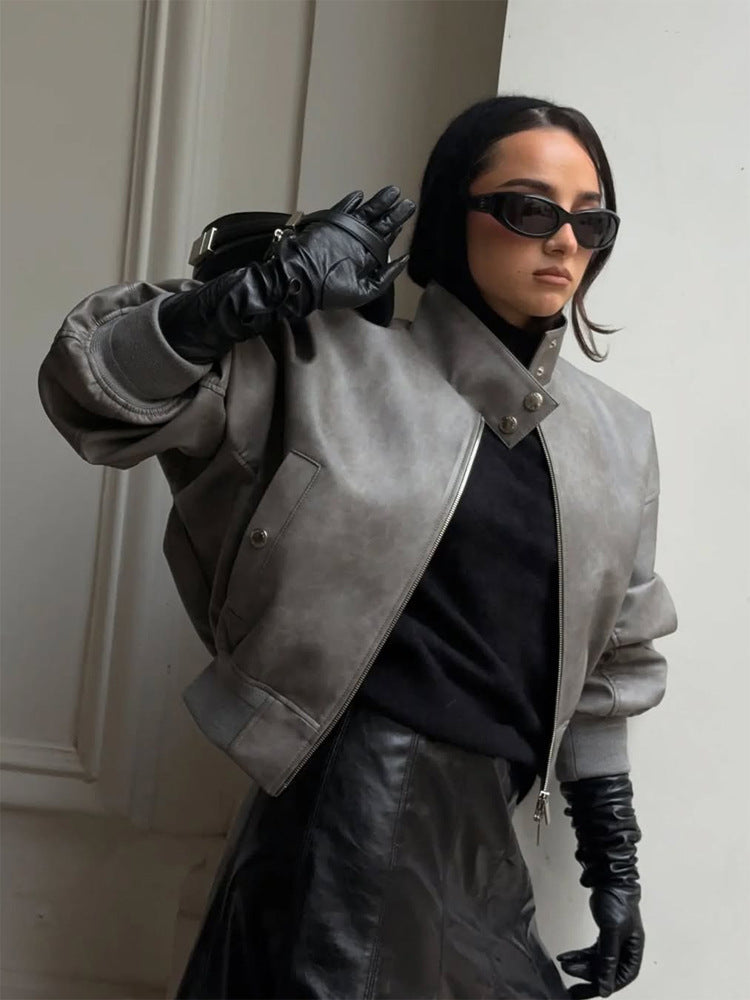 Damen Kurzer Oversize‑Lederimitat‑Bomber mit hohem Stehkragen und Druckknopfdetails Echoarchiv