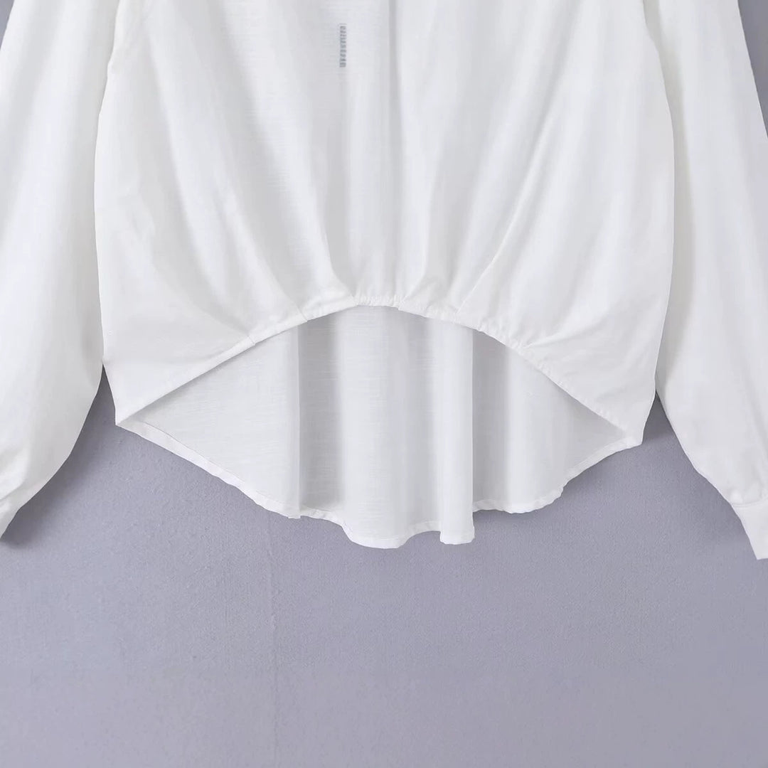 Damen Weite Bluse mit V‑Ausschnitt, Hemdkragen und gerafftem Hoch-Tief-Saum Echo Archiv