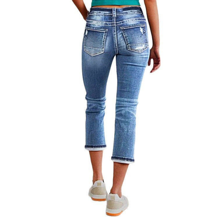 Damen kurz geschnittene Jeans mit Umschlag, mittelhoher Taille und Used‑Waschung Echo Archiv
