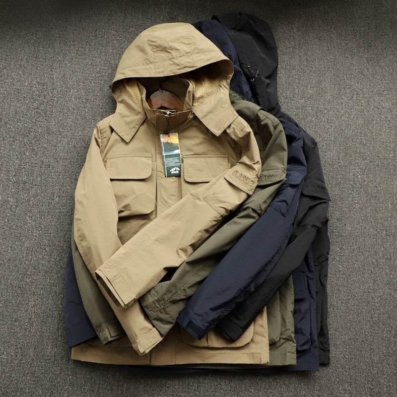 Herren urbane Feldjacke mit Mehrfach‑Taschen, windabweisender Oberfläche und verdeckter Kapuze Echo Archiv