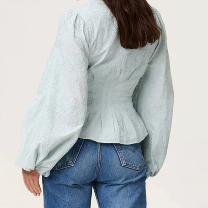 Damen Jacquard-Spitzenbluse mit tailliertem Schößchen und Ballonärmeln Echoarchiv
