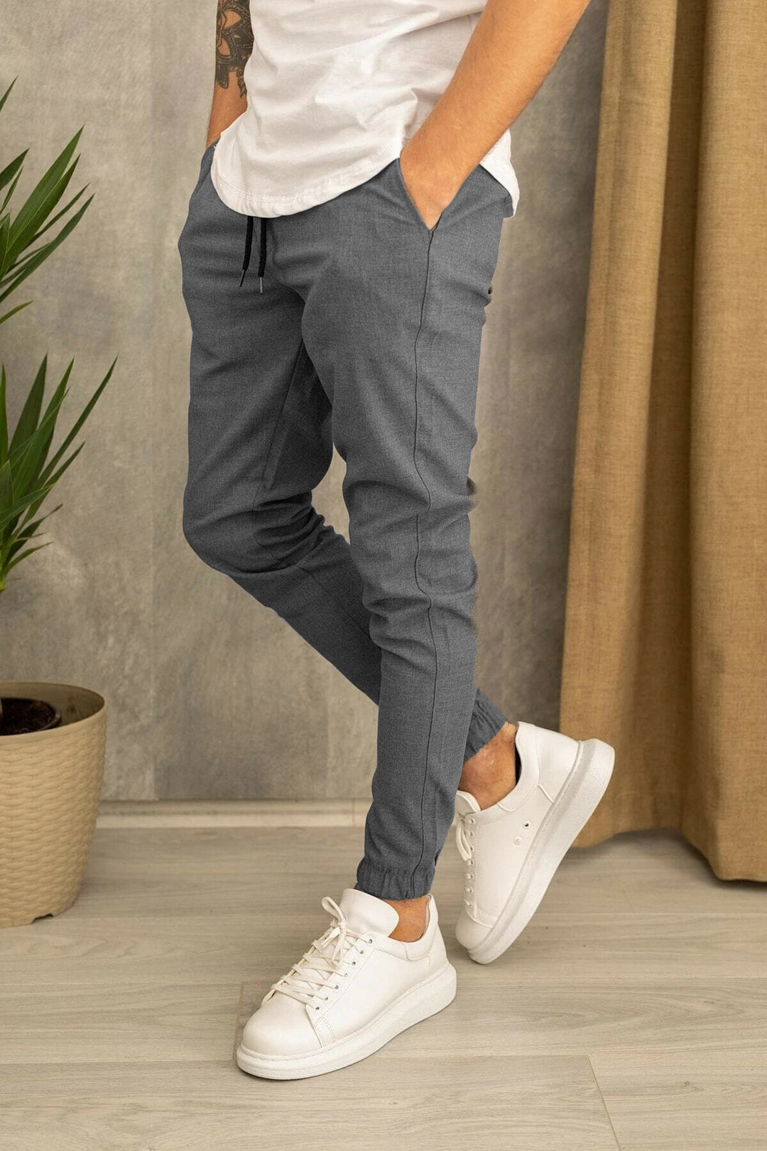 Herren Sportliche Freizeithose mit elastischem Bund und seitlichen Taschen Echoarchiv