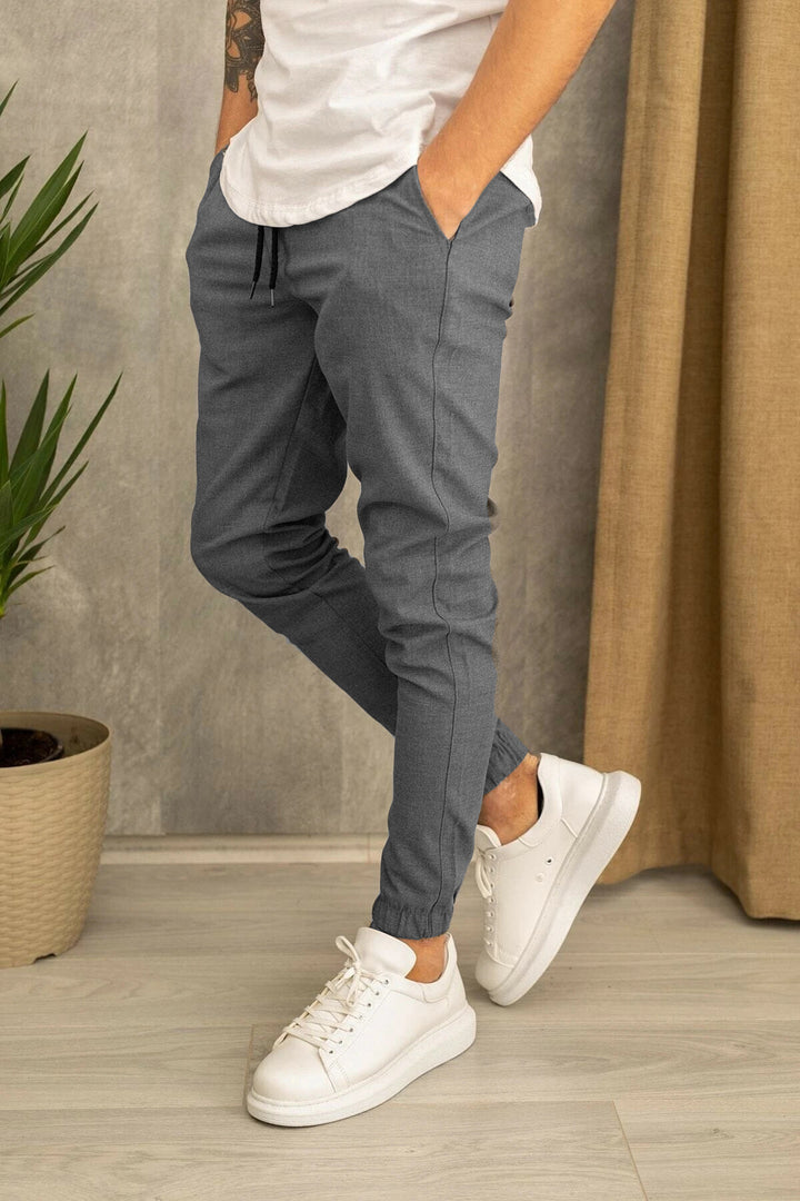 Herren Sportliche Freizeithose mit elastischem Bund und seitlichen Taschen Echoarchiv