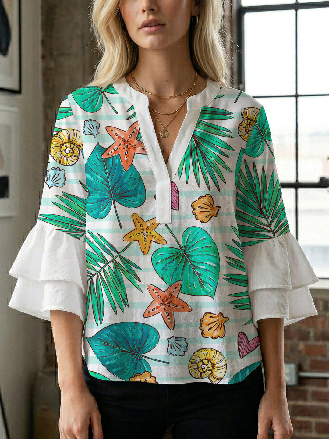 Damen Bluse mit voluminösen Rüschenärmeln und modernem Motiv Echo Archiv