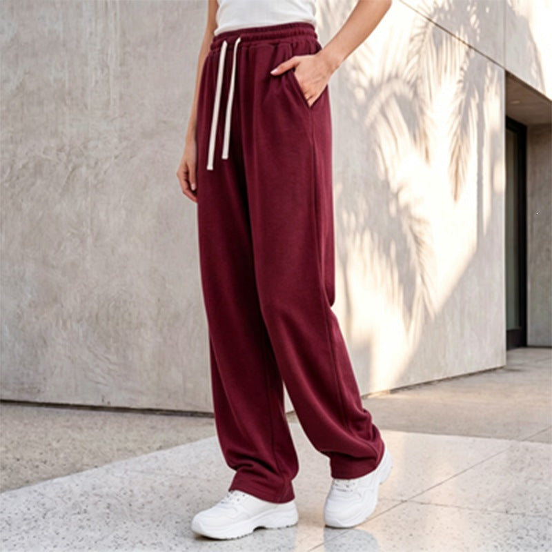 Damen nan weite Loungepalazzo-Hose mit hohem Komfortbund, Kordelzug, seitlichen Eingrifftaschen und dekorativer Seitennaht Echo Archiv