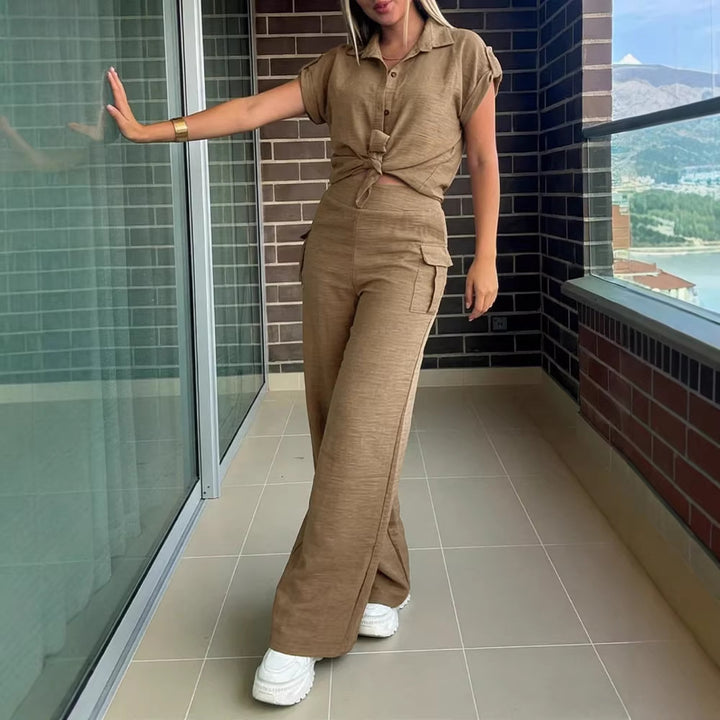 Damen lässiger Jumpsuit mit hochgeschlossenem Kragen und praktischen Seitentaschen Echo Archiv
