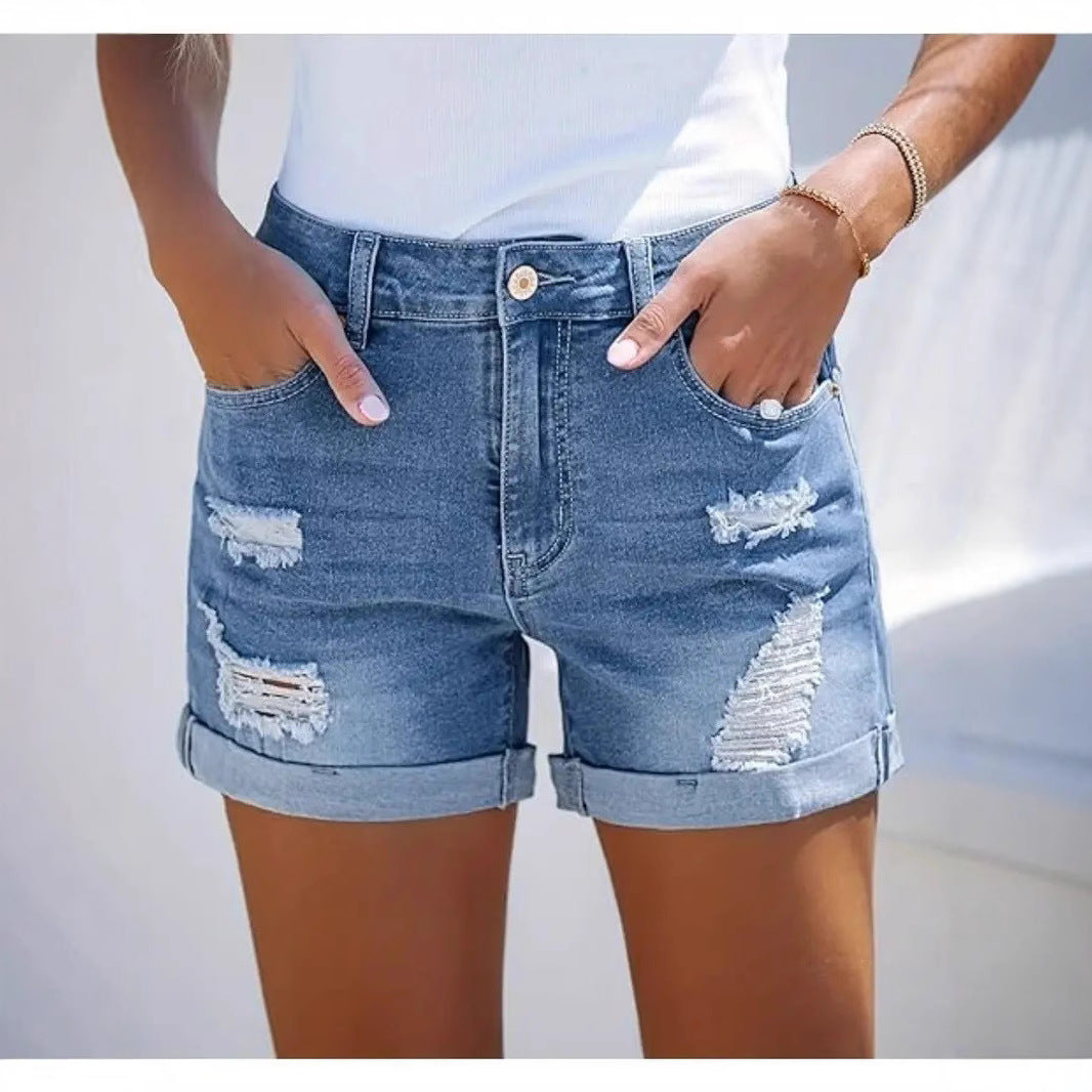 Damen kurze Destroyed Denim-Shorts im lässigen Look mit umgeschlagenen Säumen und stylischen Rissdetails Echo Archiv