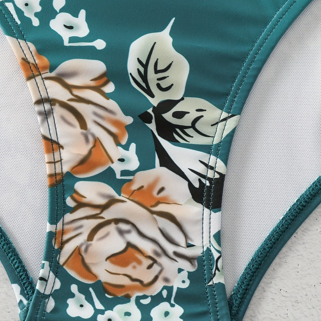 Damen Einteiliger Badeanzug mit elegantem Schnitt und floralem Design Echo Archiv