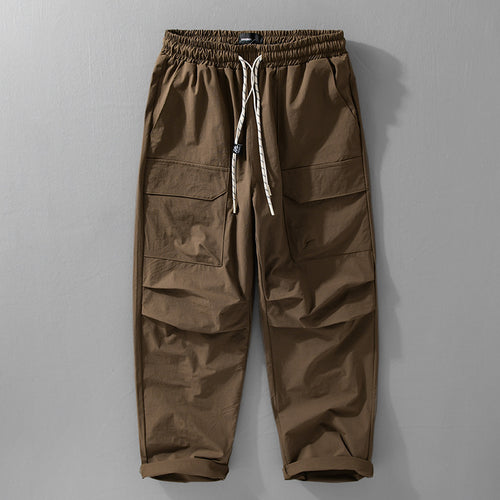 Herren Oversize-Cargohose aus leichtem Funktionsstoff mit Kordelzugbund und Mehrfachtaschen Echoarchiv