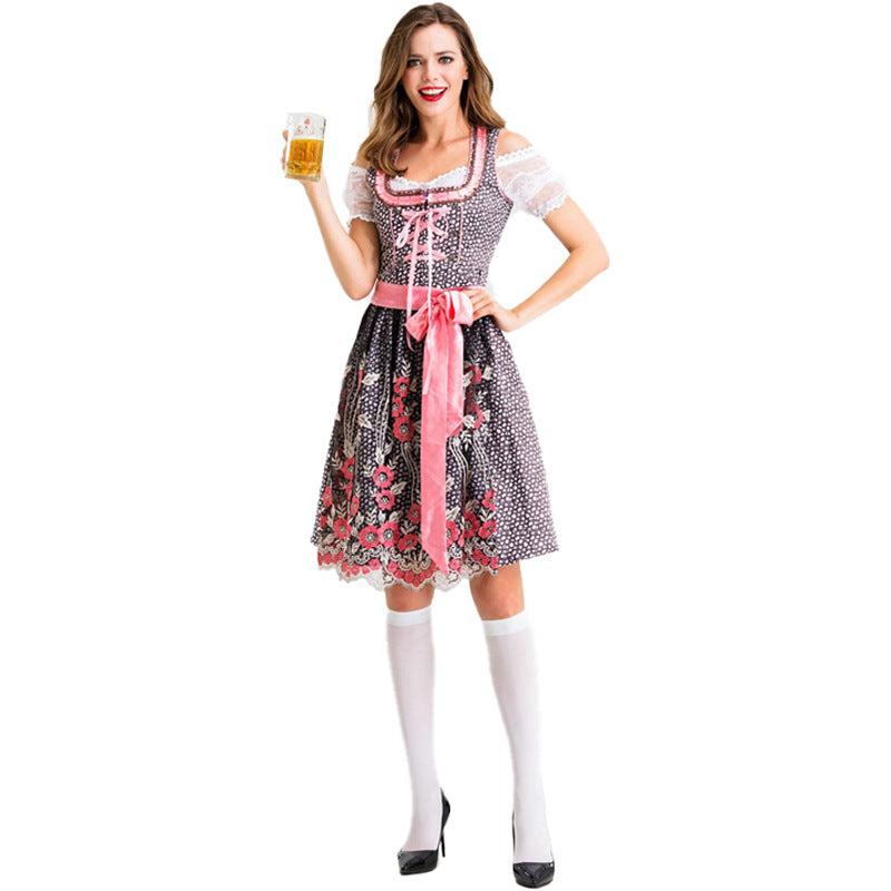 Damen nan traditionelles Kurzdirndl mit Spitzenärmeln, Schnürung und floraler Schürze Echo Archiv
