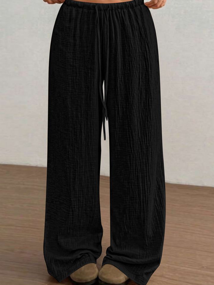 Damen Lässige Palazzo-Loungehose mit elastischem Bund und Crinkle-Struktur Echoarchiv