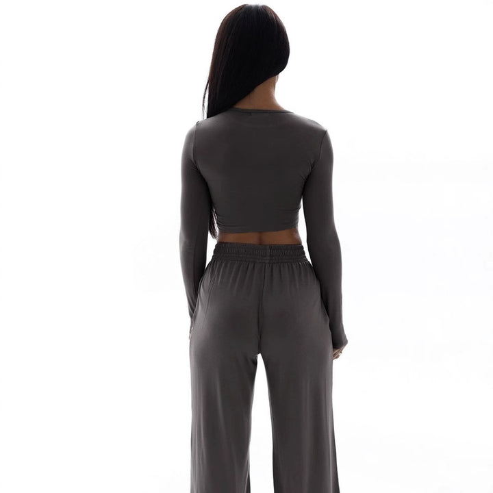 Damen Elegantes Zweiteiliges Set mit cropped Oberteil und weiten Hosen Echo Archiv
