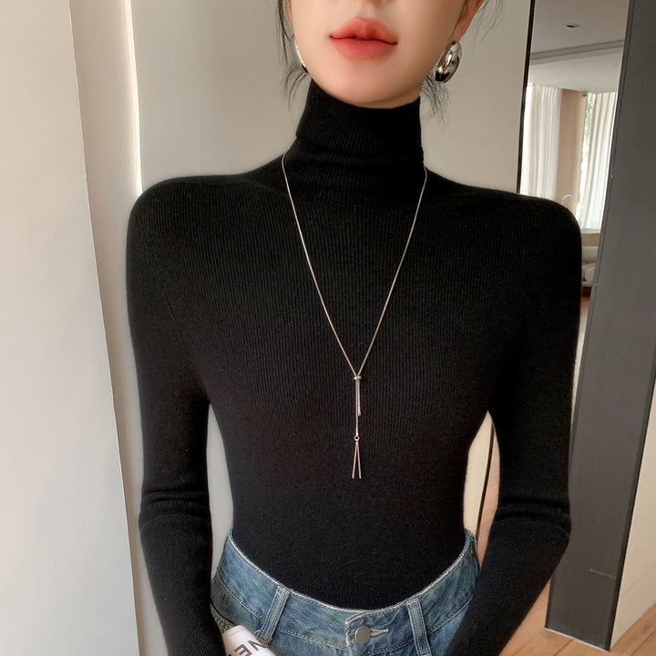 Damen Schlanker Feinstrickpullover mit hohem Rollkragen und feiner Rippstruktur Echoarchiv