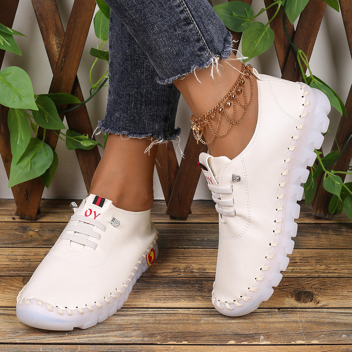 Damen Bequeme Lederoptik-Slipper mit flexibler Profilsohle und Mokassin-Naht – Lioré