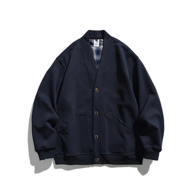 Unisex Boxy-Cardigan-Jacke mit V-Ausschnitt, aufgesetzten Taschen und kariert gefüttertem Innenfutter Echo Archiv