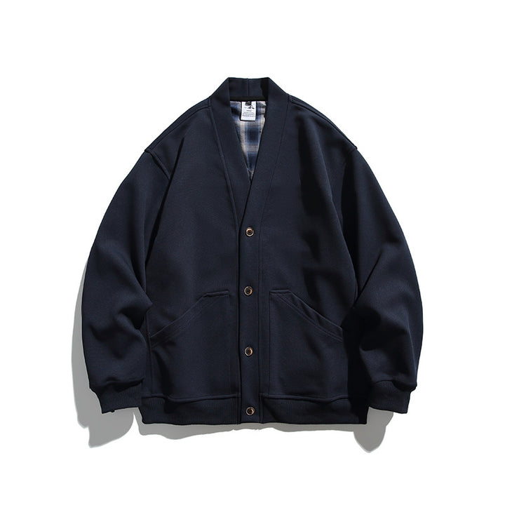 Unisex Boxy-Cardigan-Jacke mit V-Ausschnitt, aufgesetzten Taschen und kariert gefüttertem Innenfutter Echo Archiv