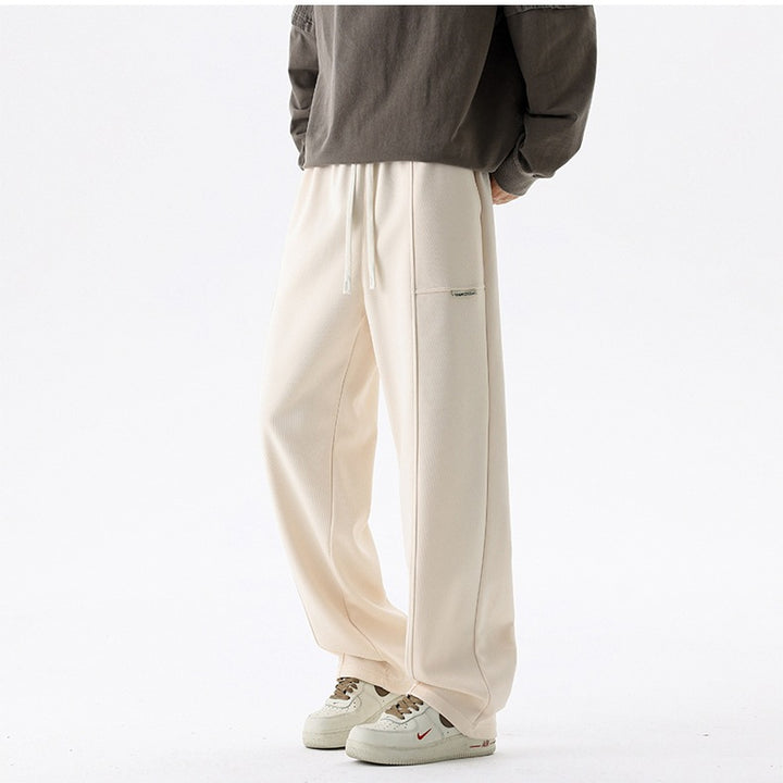 Herren Weite Relax-Jogginghose mit Tunnelzug, Multifunktionstasche & geradem Bein Echoarchiv