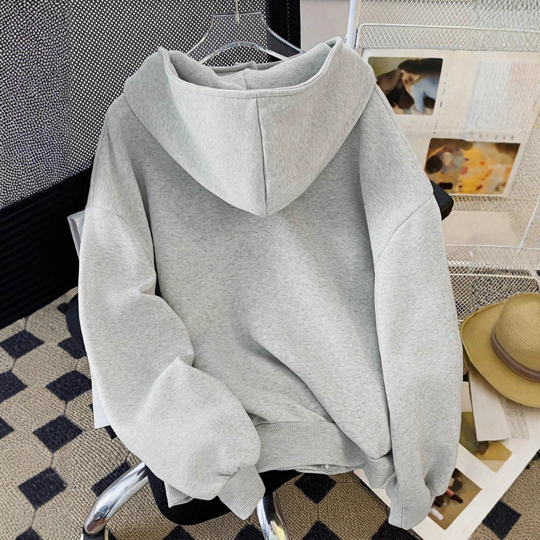 Damen Oversized Kapuzenjacke mit asymmetrischem Reißverschluss und Cut-Out-Detail – Avérine