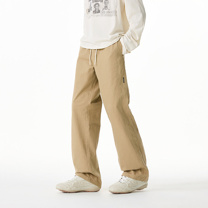 Herren Locker geschnittene Baumwoll-Canvas-Hose mit Tunnelzugbund, geradem Bein und Ziernaht-Details Echo Archiv