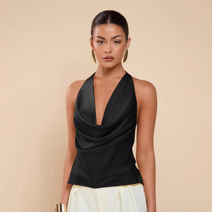 Damen Elegantes Wickeloberteil mit tiefem V-Ausschnitt und fließendem Stoff Echo Archiv