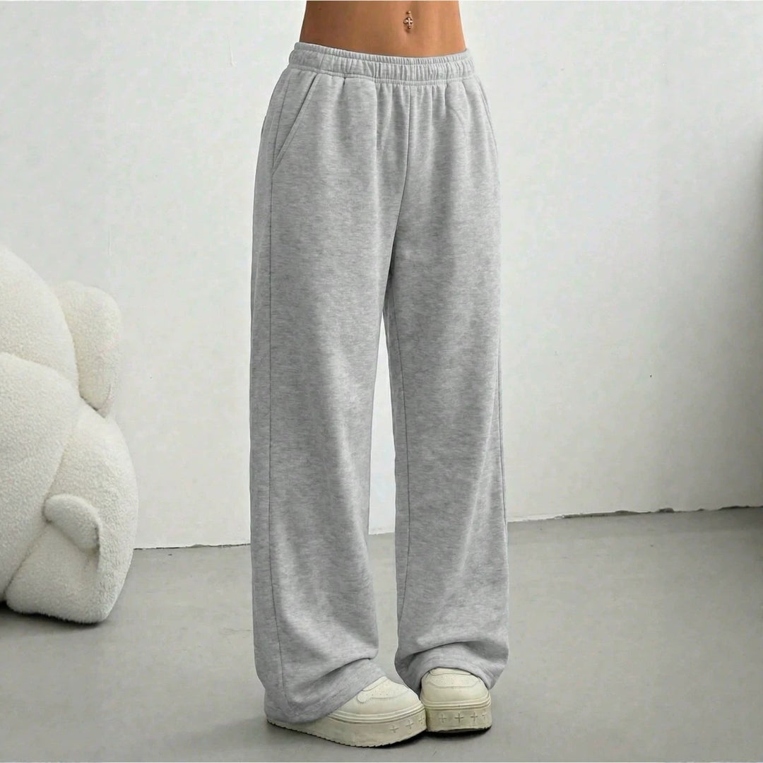 Damen weite Loungehose mit elastischem Bund, seitlichen Eingrifftaschen und fließendem Bein – Avélisse