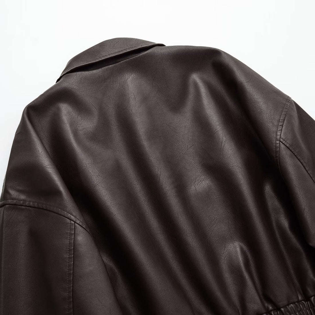 Damen Kurze Boxy-Bomberjacke aus veganer Lederoptik mit Hemdkragen und elastischem Bund Echoarchiv