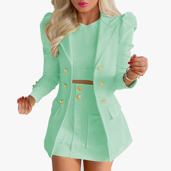 Damen nan tailliertes Zweiteiler-Businesskostüm mit doppelreihigem Blazer und figurbetontem Minirock Echo Archiv