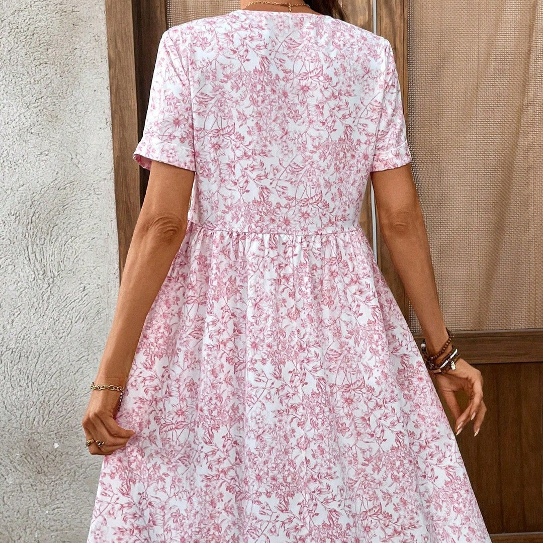 Damen Sommerliches Kleid mit floralem Muster und V-Ausschnitt Echo Archiv