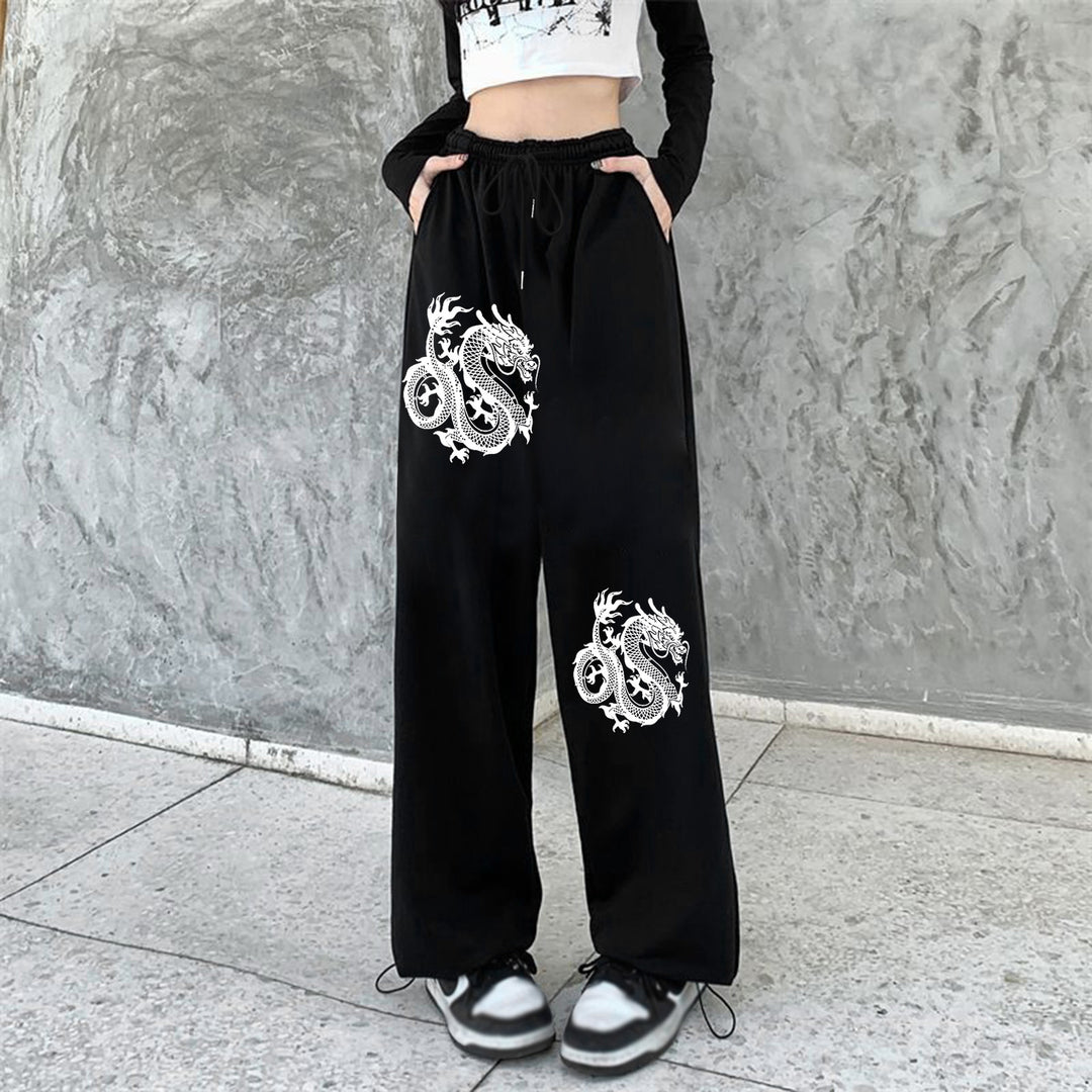 Damen weite Jogginghose hochgeschnitten mit seitlichem Statementprint und elastischem Bund – Avélisse